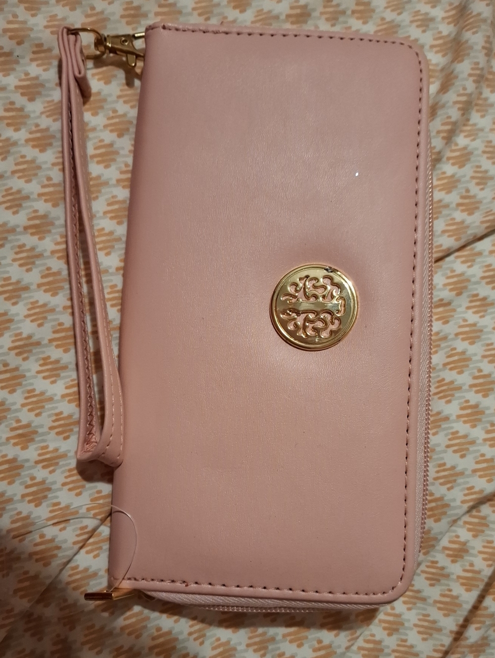 Pink Wristlet Wallet with Gold Emblem